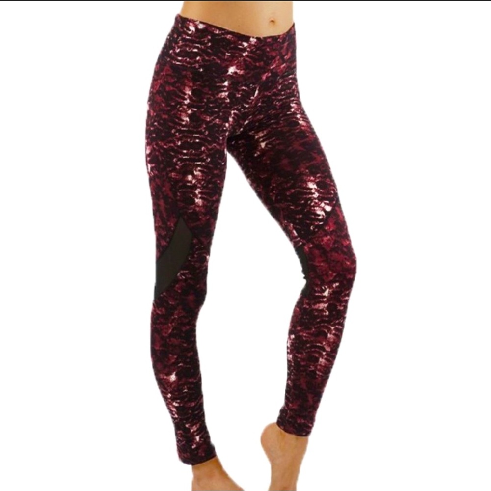 Mid-Rise Animal print, Soft Leggings with mesh panels.